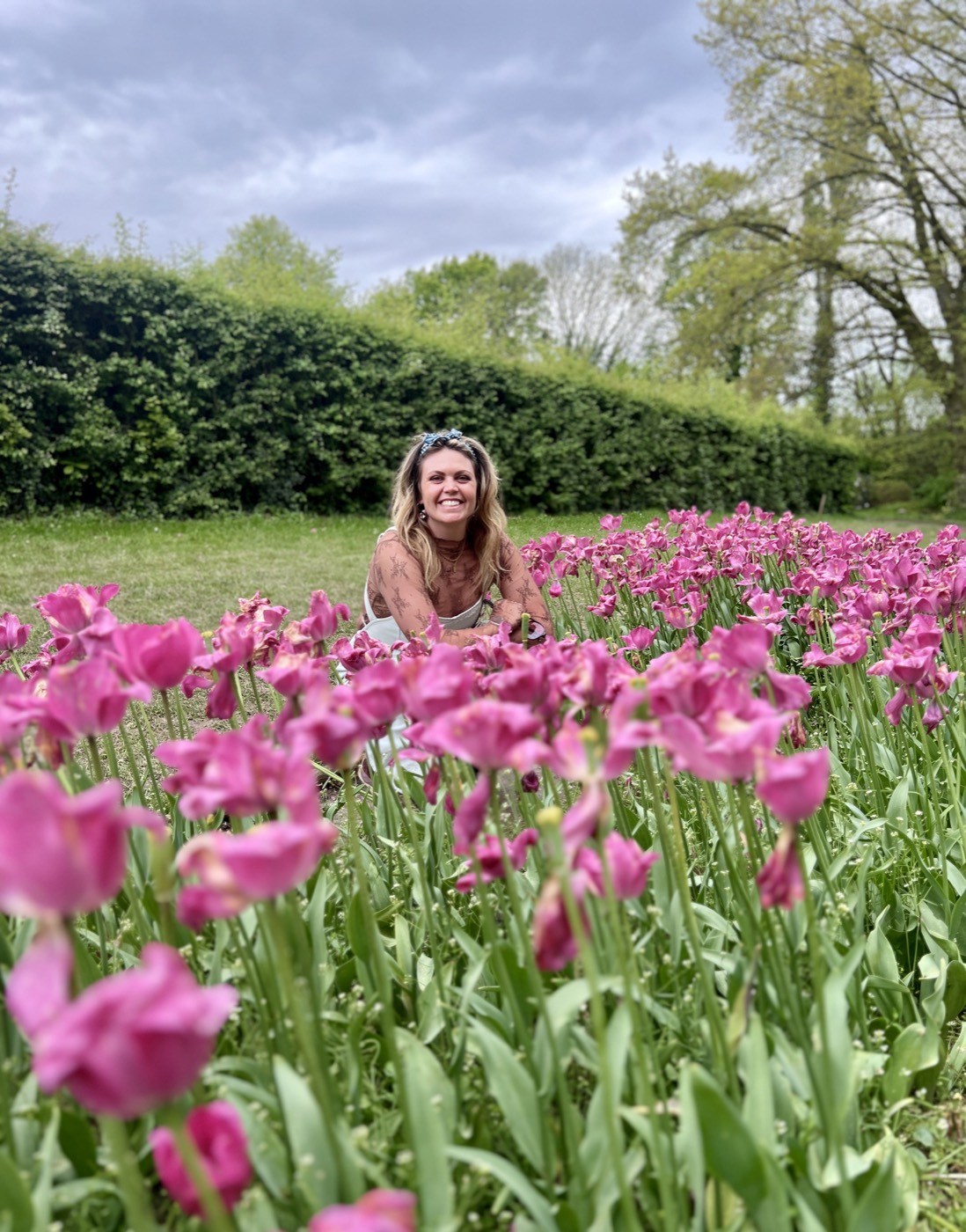 Emily Couch among pink tulips
