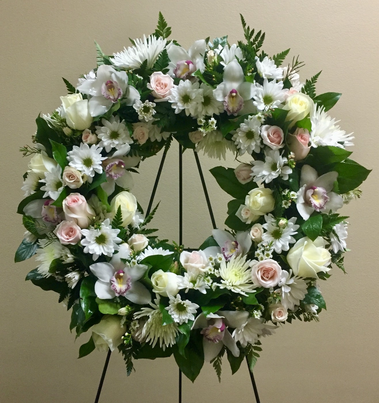 A sympathy arrangement by The Flower Couch