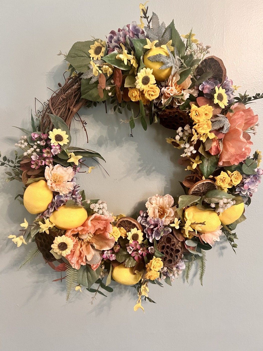 A handmade fresh wreath by The Flower Couch